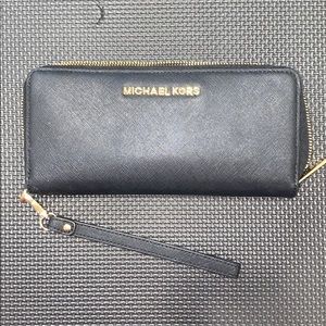 Michael Kors Wristlet (Black and Gold)